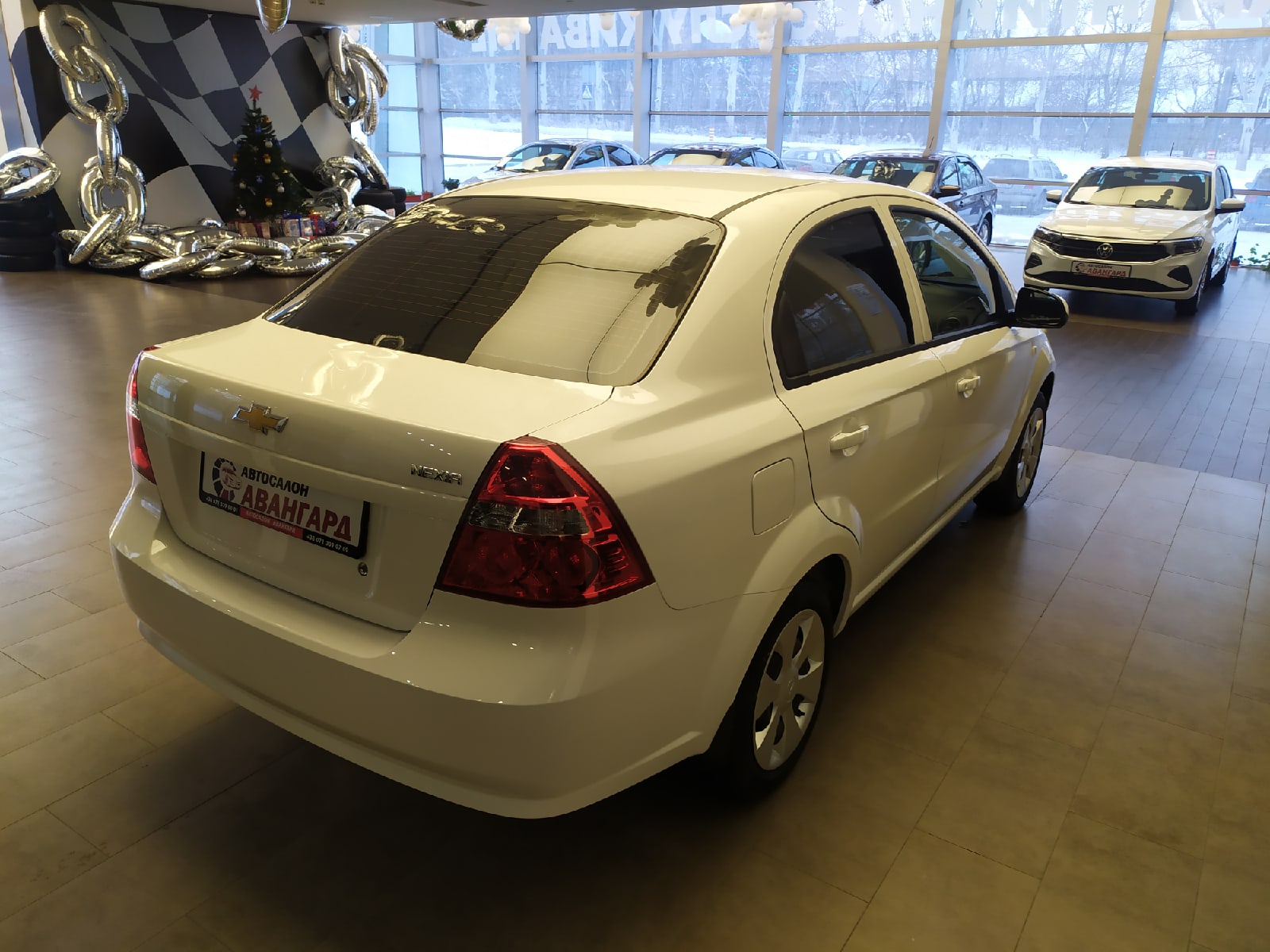 Chevrolet Nexia 1.5 16 кл. (105 л.с.) 5МТ комплектации LT, цвет белый