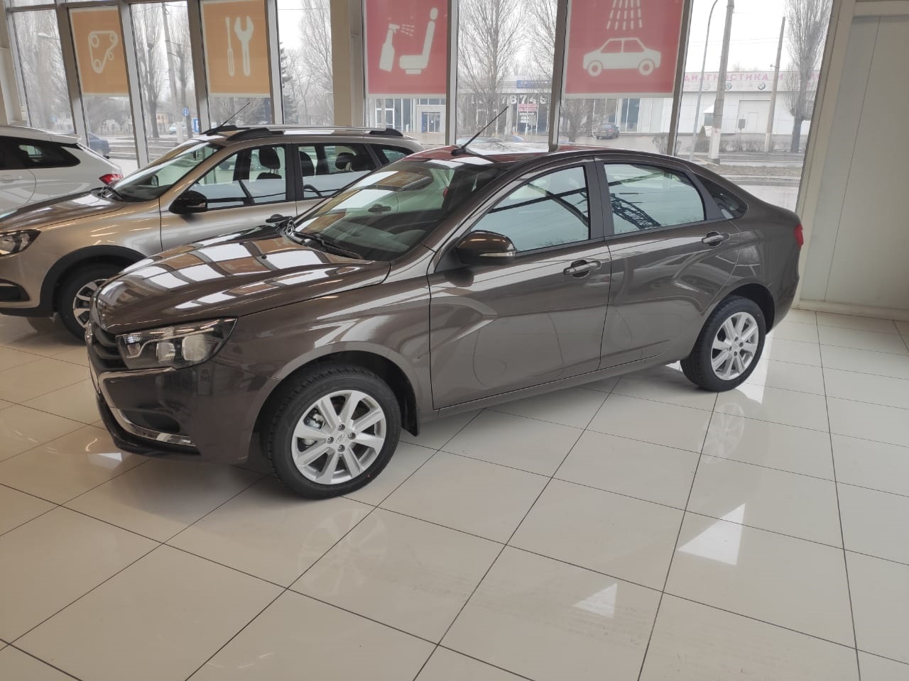 LADA Vesta седан 1.6 л., 16-кл., (106 л.с.) 5МТ. Comfort Winter. Коричневый  Ангкор Автосалон Макеевка 2021 | Купить новый автомобиль в Донецке ДНР, в  наличии и под заказ | Автосалон Авангард