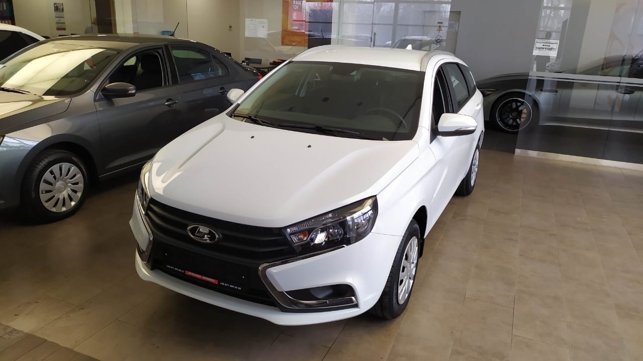 LADA Vesta SW (Лада Вест универсал) 1.6 л 16-кл. (106 л.с.), 5МТ. Comfort.  Белый | Купить новый автомобиль в Донецке ДНР, в наличии и под заказ |  Автосалон Авангард