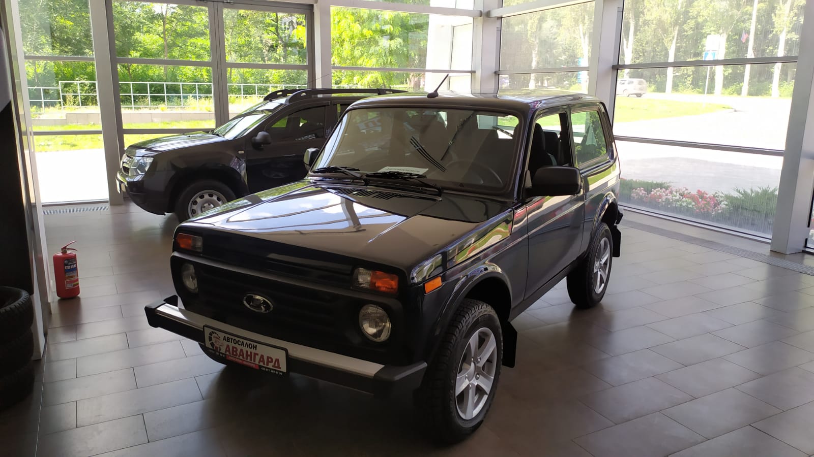 Lada Niva Legend 3дв. 1.7 8 кл. 83 л.с 5МТ. Luxe-Кондиционер. ТЕМНО-ЗЕЛЕНЫЙ  «НЕССИ» 2021 | Купить новый автомобиль в Донецке ДНР, в наличии и под заказ  | Автосалон Авангард