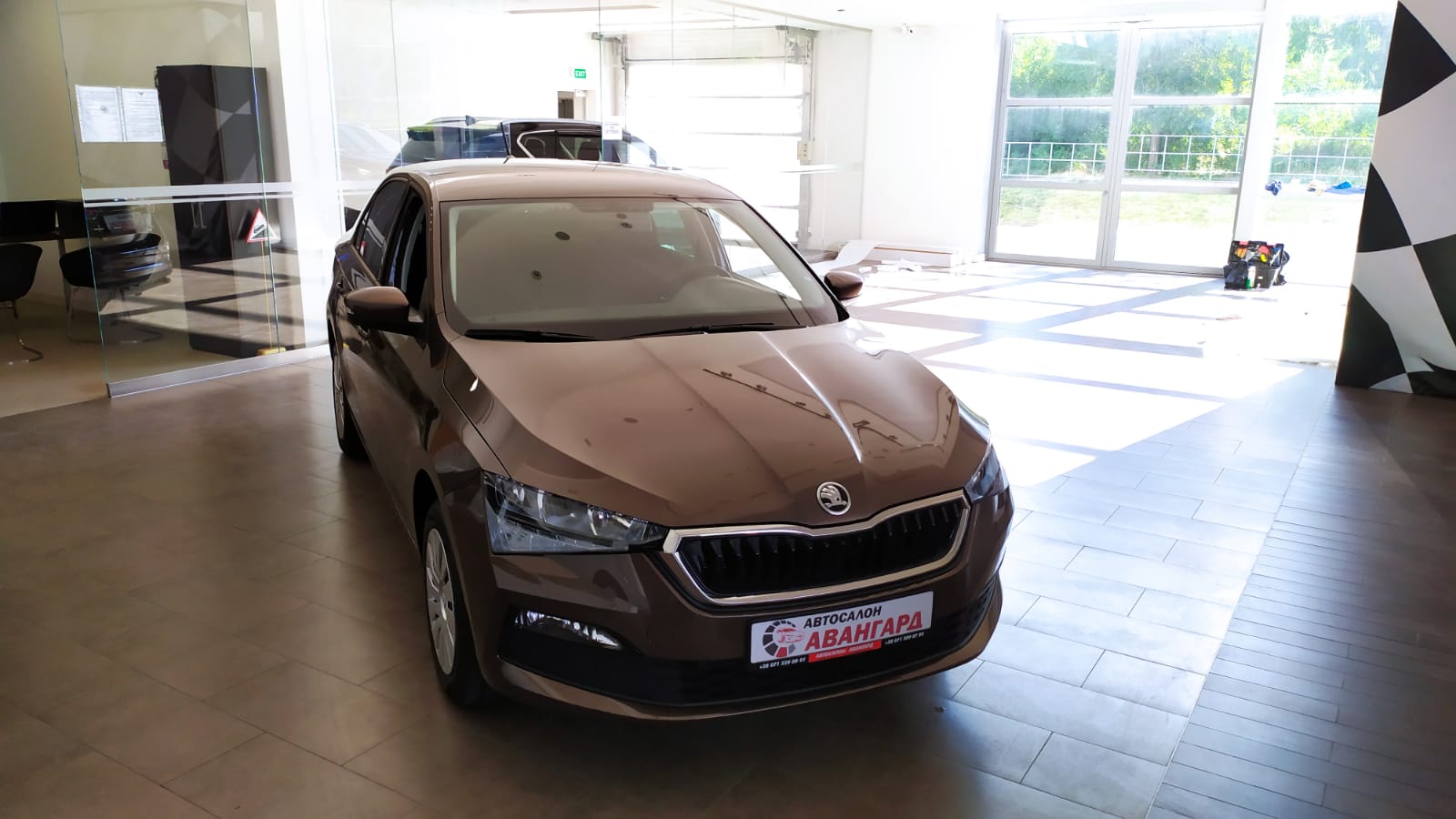 Skoda Rapid 1,6 MPI 90 л.с. 5MT-мех. Active. Коричневый. 2021 | Купить  новый автомобиль в Донецке ДНР, в наличии и под заказ | Автосалон Авангард