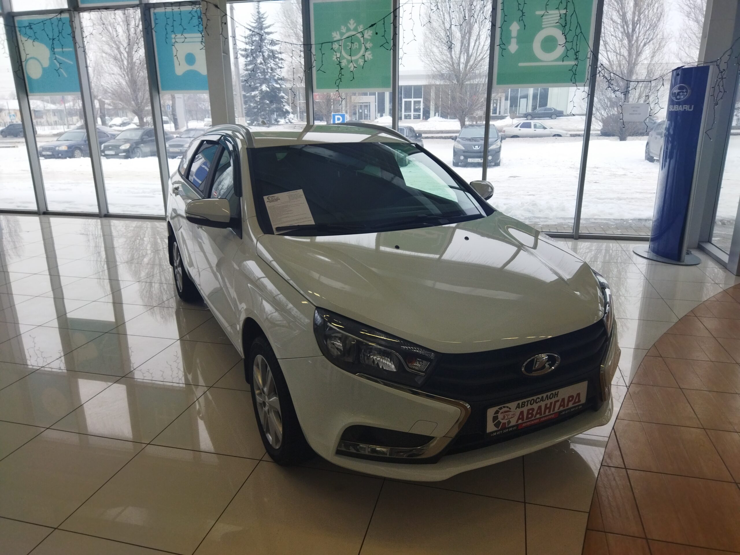 LADA Vesta SW универсал 1.6 л., 16-кл., (106 л.с.). 5MT. Comfort +R16.  Белый. 2021 | Купить новый автомобиль в Донецке ДНР, в наличии и под заказ  | Автосалон Авангард