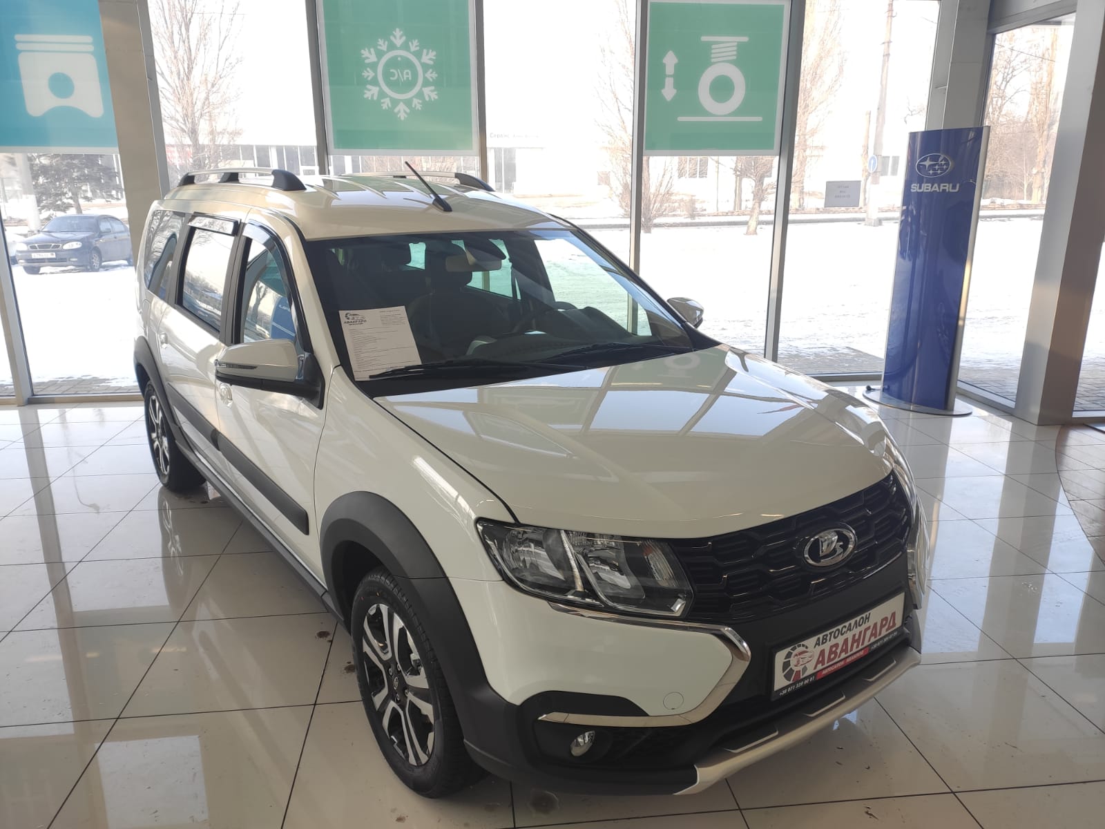 LADA Largus Cross универсал 5 МЕСТ 1.6 л., 16-кл., (106 л.с.) 5MT. Luxe  Prestige. Белый. 2021 | Купить новый автомобиль в Донецке ДНР, в наличии и  под заказ | Автосалон Авангард